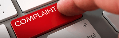Red complaint key on a keyboard